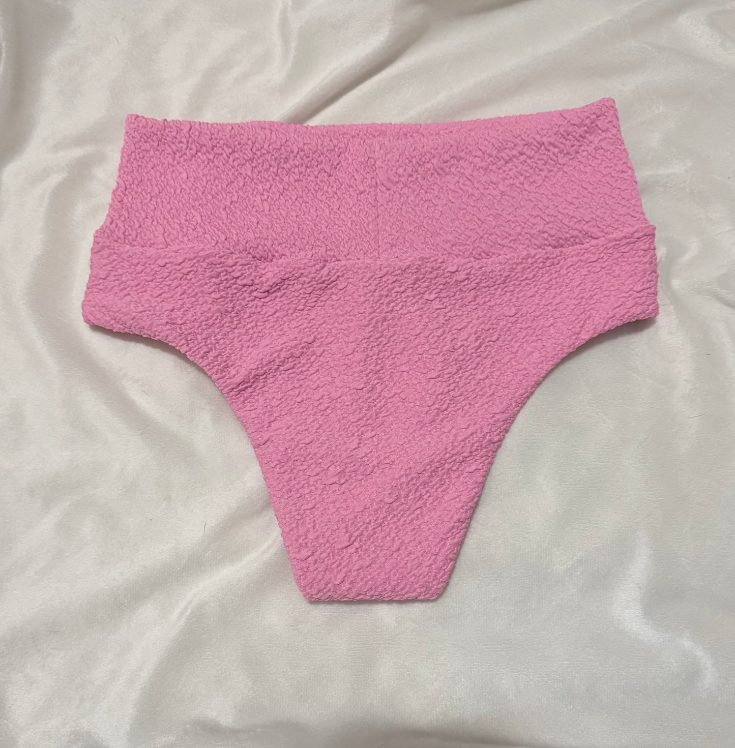 Pastel pink, high rise bottoms
